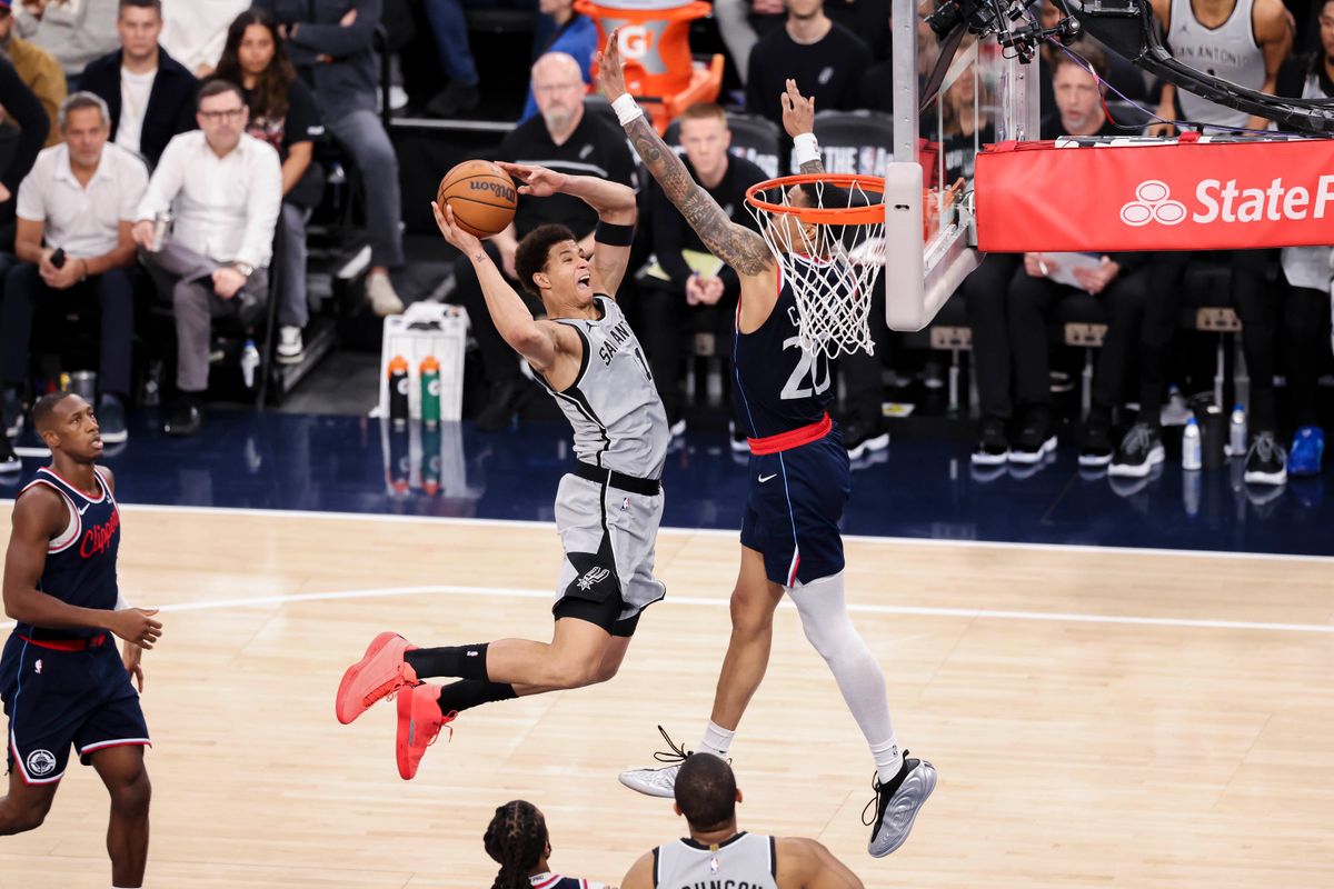 Carter Bryant #11 of the San Antonio Spurs drives towards the rim during an NBA basketball game against the LA Clippers, Monday March 16, 2026 in Inglewood, Calif. Carter Bryant #11 of the San Antonio Spurs drives towards the rim during an NBA basketball game against the LA Clippers, Monday March 16, 2026 in Inglewood, Calif.