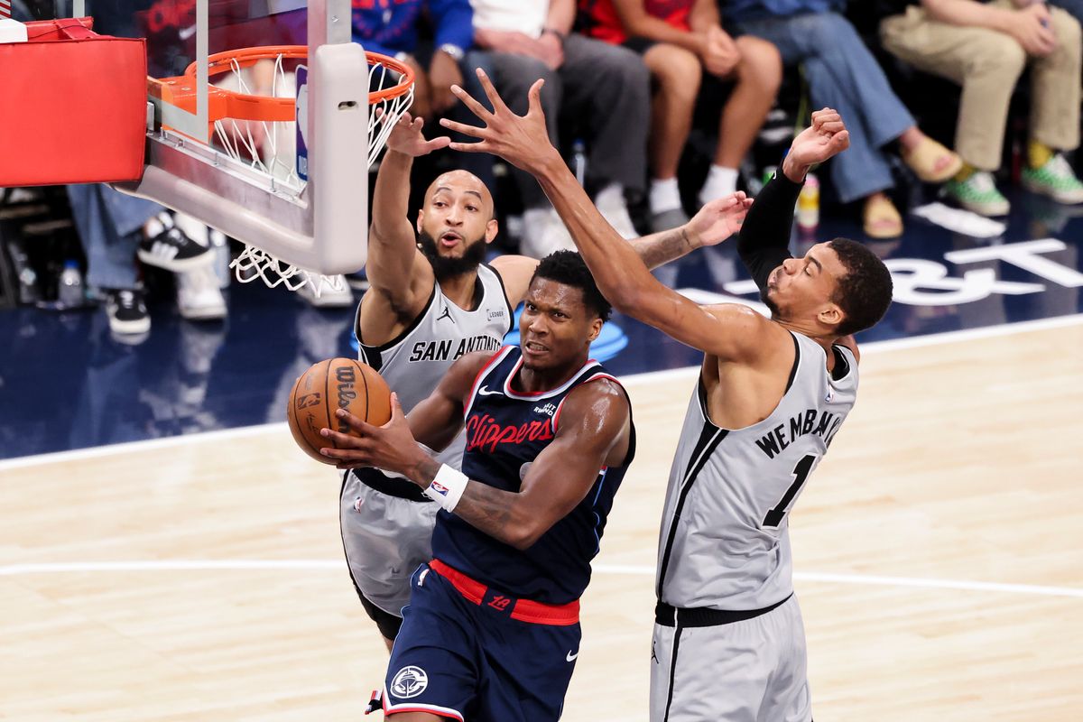 Bennedict Mathurin #9 of the LA Clippers drives towards the rim past Victor Wembanyama #1 of the San Antonio Spurs during an NBA basketball game, Monday March 16, 2026 in Inglewood, Calif. Bennedict Mathurin #9 of the LA Clippers drives towards the rim past Victor Wembanyama #1 of the San Antonio Spurs during an NBA basketball game, Monday March 16, 2026 in Inglewood, Calif.