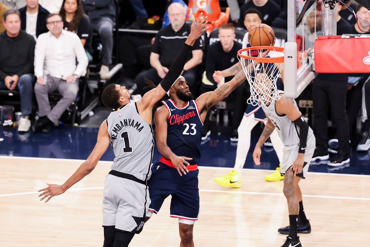 Isaiah Jackson #23 of the LA Clippers lays the ball up past Victor Wembanyama #1 of the San Antonio Spurs during an NBA basketball game, Monday March 16, 2026 in Inglewood, Calif. Isaiah Jackson #23 of the LA Clippers lays the ball up past Victor Wembanyama #1 of the San Antonio Spurs during an NBA basketball game, Monday March 16, 2026 in Inglewood, Calif.