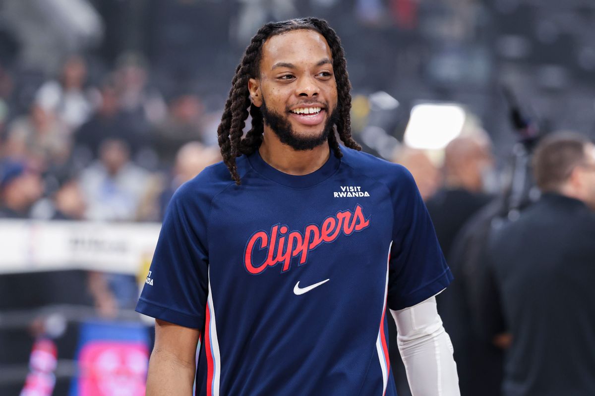 Darius Garland #10 of the LA Clippers smiles on the court during warm-ups before an NBA basketball game against the Milwaukee Bucks, Monday March 23, 2026 in Inglewood, Calif.