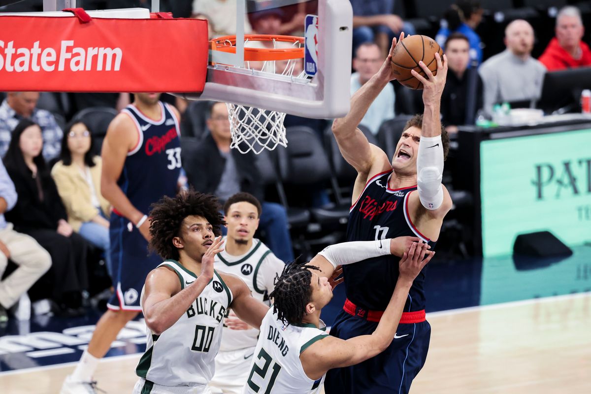 Brook Lopez #11 of the LA Clippers drives towards the rim during an NBA basketball game against the Milwaukee Bucks, Monday March 23, 2026 in Inglewood, Calif.