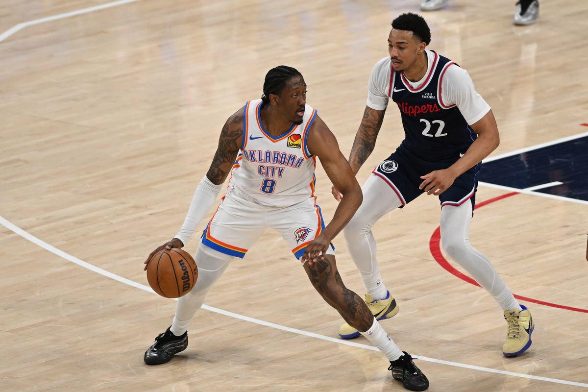 OKC Thunder guard Jalen Williams (8) posts up against LA Clippers guard Jordan Miller (22) during a game between the Los Angeles Clippers and OKC Thunder on Wednesday, April 8, 2026 at Intuit Dome in Inglewood Calif