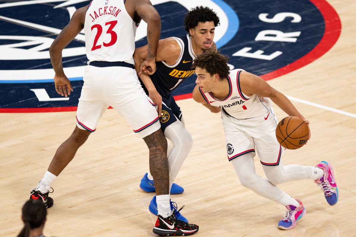 LA Clippers guard Keaton Wagler (1) uses a screen to make a move to the basket during an NBA basketball game against the Denver Nuggets, Wednesday, October 14, 2026 in Inglewood. LA Clippers guard Keaton Wagler (1) uses a screen to make a move to the basket during an NBA basketball game against the Denver Nuggets, Wednesday, October 14, 2026 in Inglewood.