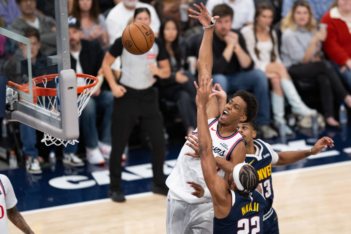 LA Clippers forward Baba Miller (18) gets fouled during an NBA basketball game against the Denver Nuggets, Wednesday, October 14, 2026 in Inglewood. LA Clippers forward Baba Miller (18) gets fouled during an NBA basketball game against the Denver Nuggets, Wednesday, October 14, 2026 in Inglewood.