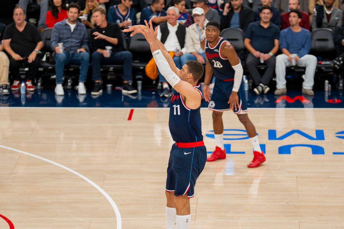 Los Angeles Clippers center Brook Lopez (11) makes a three pointer during an NBA basketball game against the Sacramento Kings, Wednesday October 21st, 2026 in Los Angeles, California.