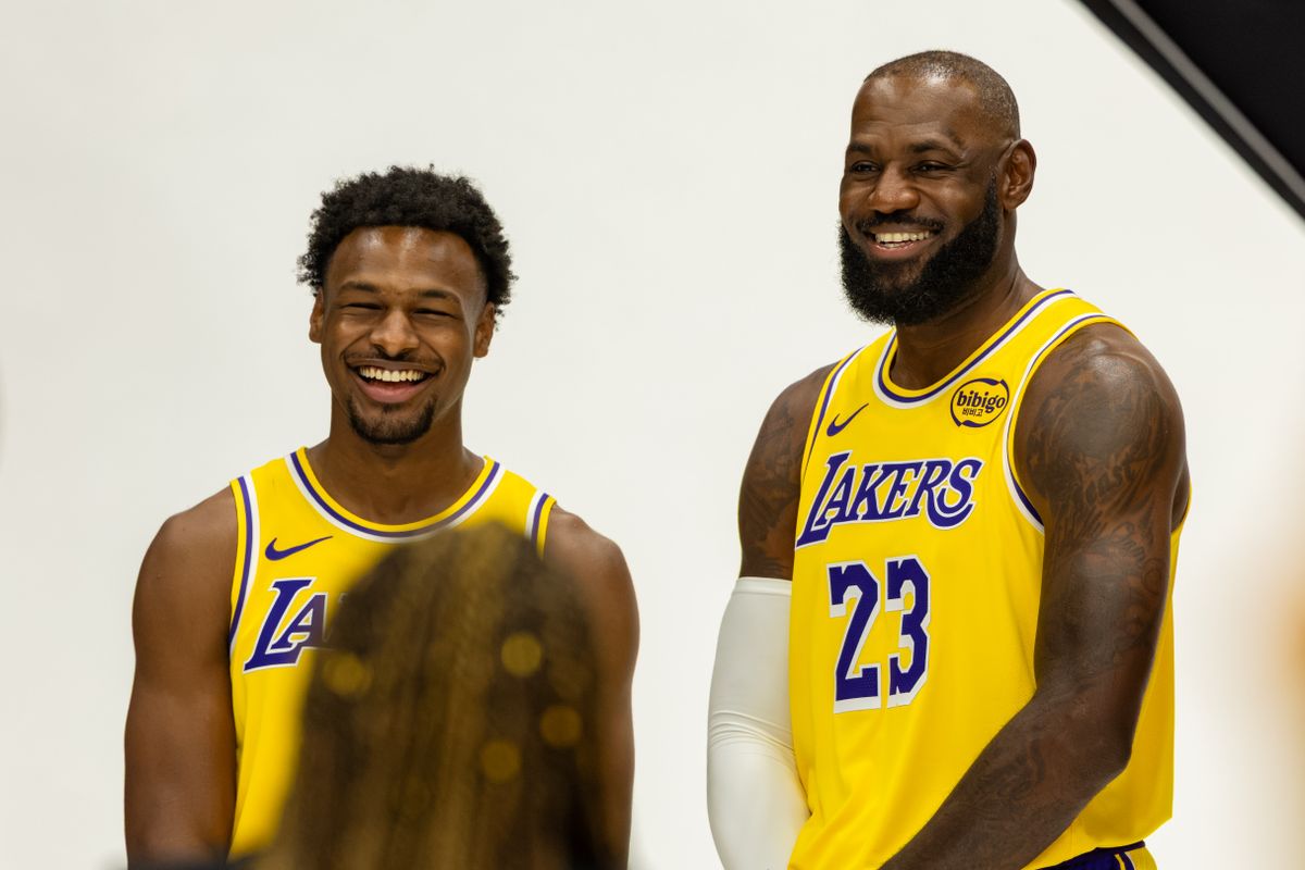 Bronny James #9 and LeBron James #23 of the Los Angeles Lakers laugh in between photos during Lakers Media Day at UCLA Health Training Center on September 29, 2025 in El Segundo, California. Bronny James #9 and LeBron James #23 of the Los Angeles Lakers laugh in between photos during Lakers Media Day at UCLA Health Training Center on September 29, 2025 in El Segundo, California.