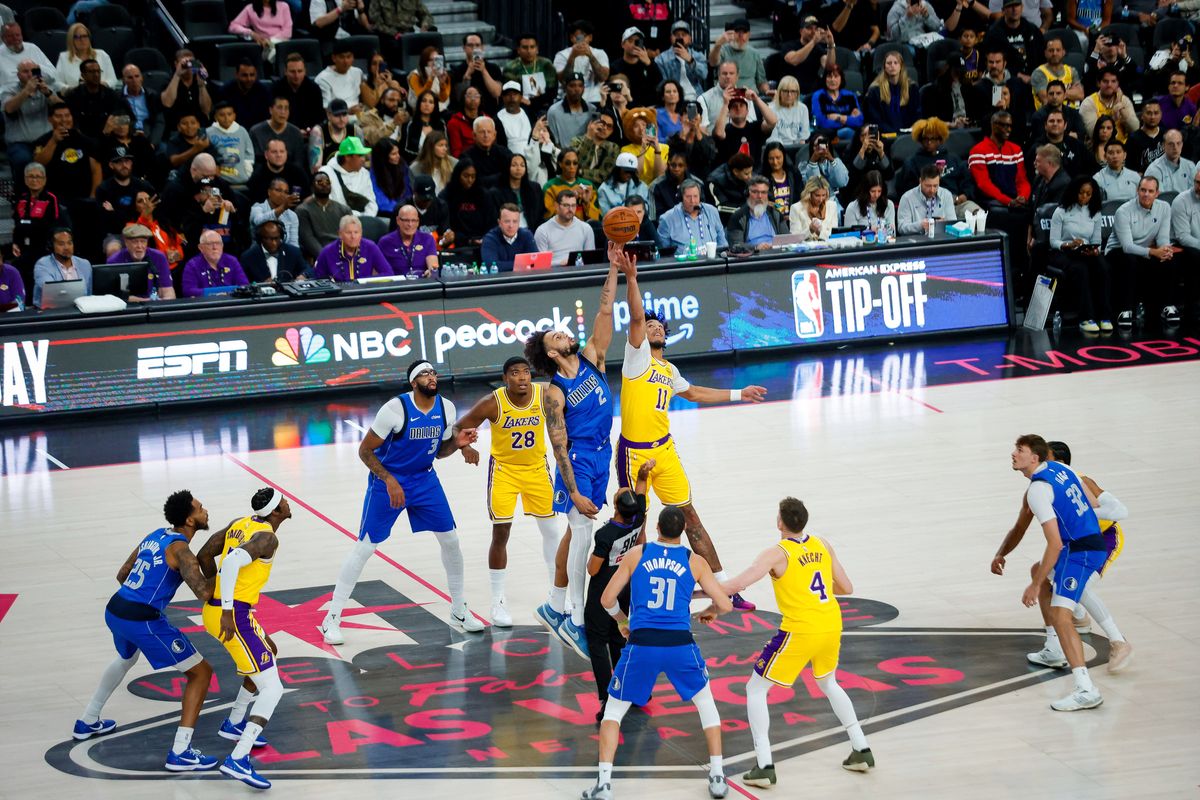 Los Angeles center Jaxson Hayes (11) and Dallas Mavericks center Dereck Lively II (2) jump for the ball at tip-off during a NBA preseason game between the Los Angeles Lakers and the Dallas Mavericks, Wednesday October 15, 2025 in Las Vegas, Nev. Los Angeles center Jaxson Hayes (11) and Dallas Mavericks center Dereck Lively II (2) jump for the ball at tip-off during a NBA preseason game between the Los Angeles Lakers and the Dallas Mavericks, Wednesday October 15, 2025 in Las Vegas, Nev.