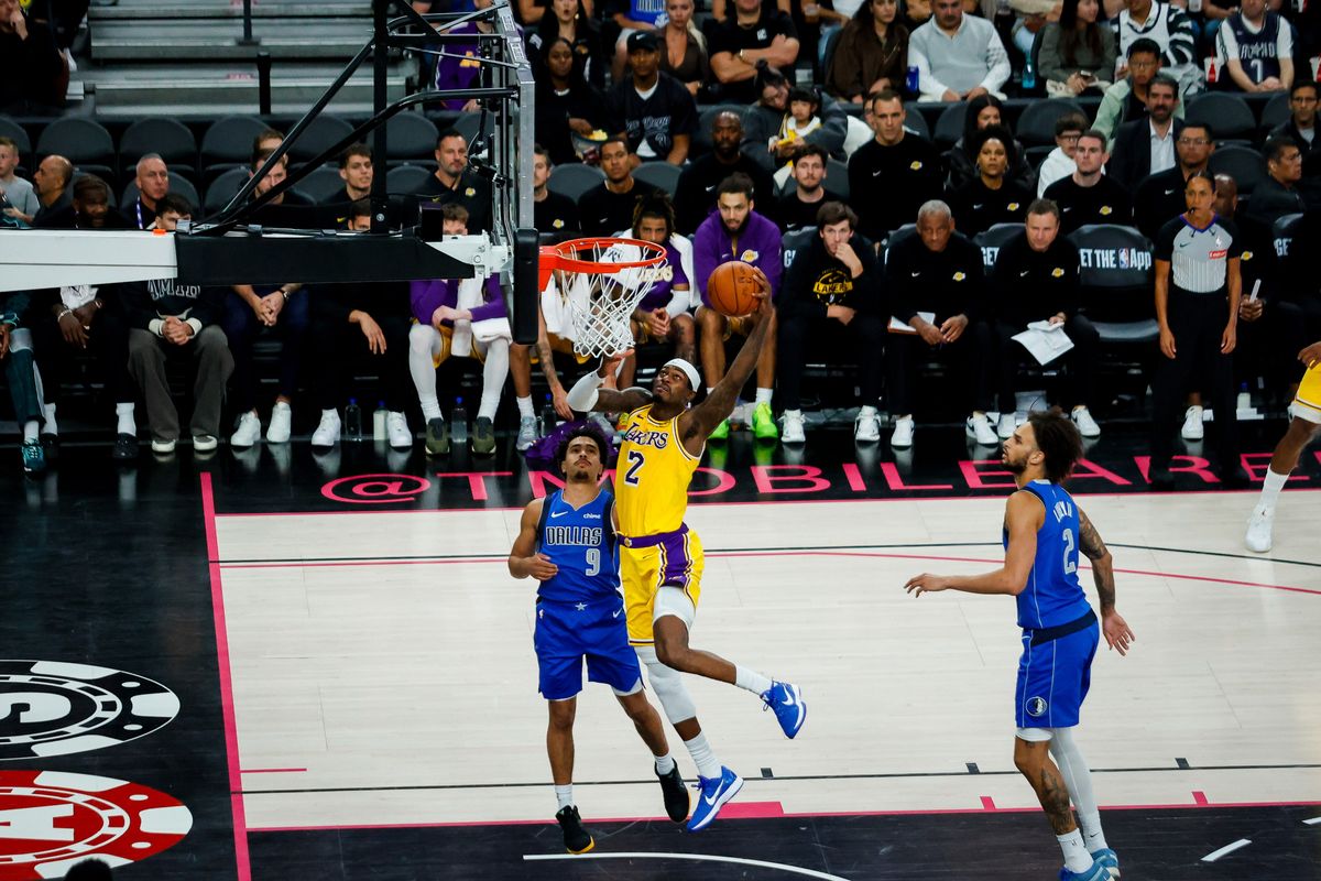 Los Angeles forward Jarred Vanderbilt (2) attempts to dunk the ball during a NBA preseason game between the Los Angeles Lakers and the Dallas Mavericks, Wednesday October 15, 2025 in Las Vegas, Nev. Los Angeles forward Jarred Vanderbilt (2) attempts to dunk the ball during a NBA preseason game between the Los Angeles Lakers and the Dallas Mavericks, Wednesday October 15, 2025 in Las Vegas, Nev.