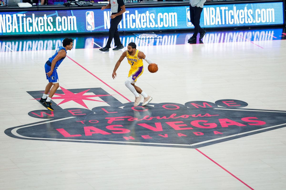 Los Angeles guard Gabe Vincent (7) dribbles up the court during a NBA preseason game between the Los Angeles Lakers and the Dallas Mavericks, Wednesday October 15, 2025 in Las Vegas, Nev. Los Angeles guard Gabe Vincent (7) dribbles up the court during a NBA preseason game between the Los Angeles Lakers and the Dallas Mavericks, Wednesday October 15, 2025 in Las Vegas, Nev.