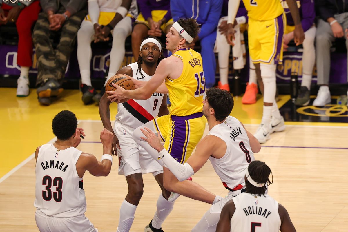 #15 G Austin Reaves of the Los Angeles Lakers drives in for a layup during an NBA game against the Portland Trailblazers on October 27, 2025 in Los Angeles, CA.