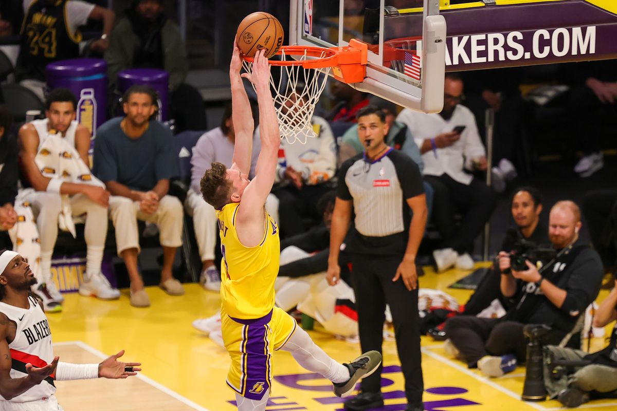 #4 G Dalton Knecht of the Los Angeles Lakers dunks the basketball during an NBA game against the Portland Trailblazers on October 27, 2025 in Los Angeles, CA.