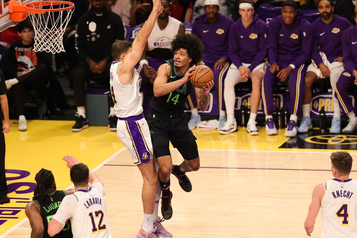 #14 G/F Micah Peavy of the New Orlean Pelicans attempts a lay up during an NBA game against the Los Angeles Lakers on November 30, 2025 in Los Angeles, CA.