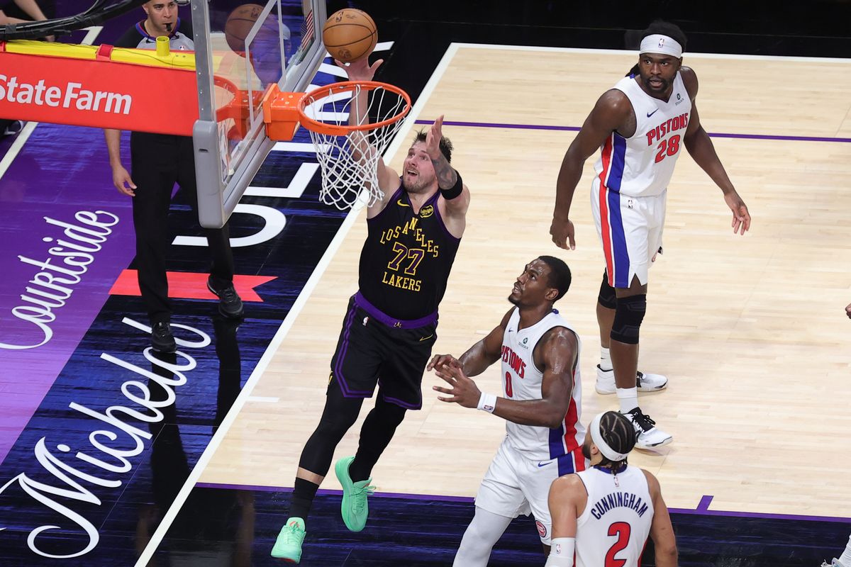 #77 PG Luka Doncic of the Los Angeles Lakers drives the lane during an NBA game against the Detroit Pistons on December 30, 2025 in Los Angeles, CA.