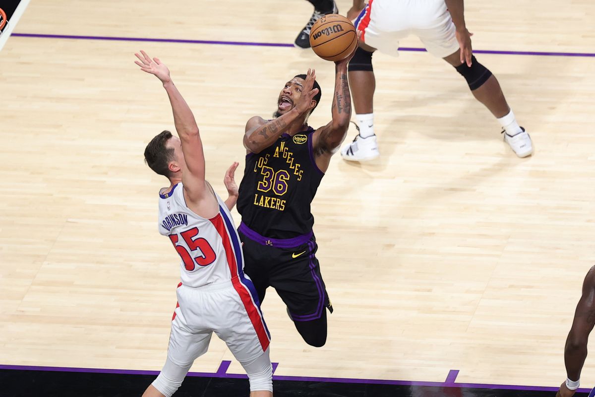 #36 PG Marcus Smart of the Los Angeles Lakers shoots the basketball during an NBA game against the Detroit Pistons on December 30, 2025 in Los Angeles, CA.