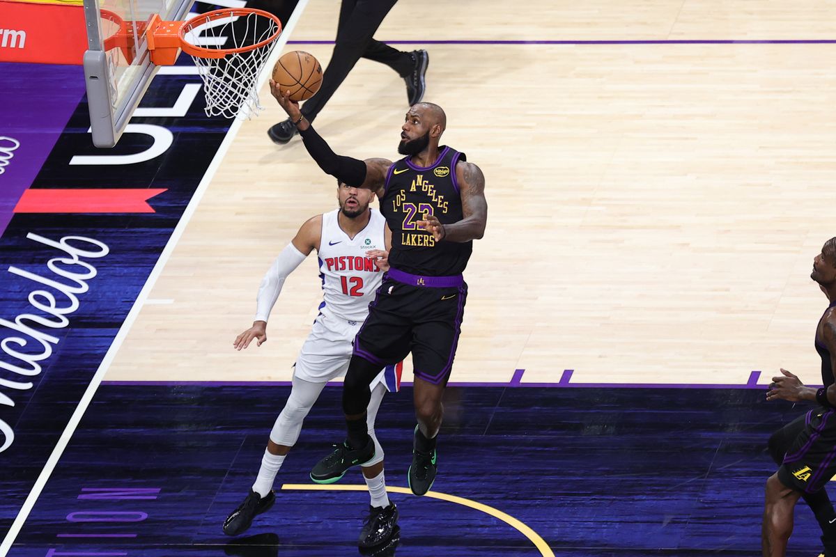 #23 SF LeBron James of the Los Angeles Lakers attempts a layup during an NBA game against the Detroit Pistons on December 30, 2025 in Los Angeles, CA.