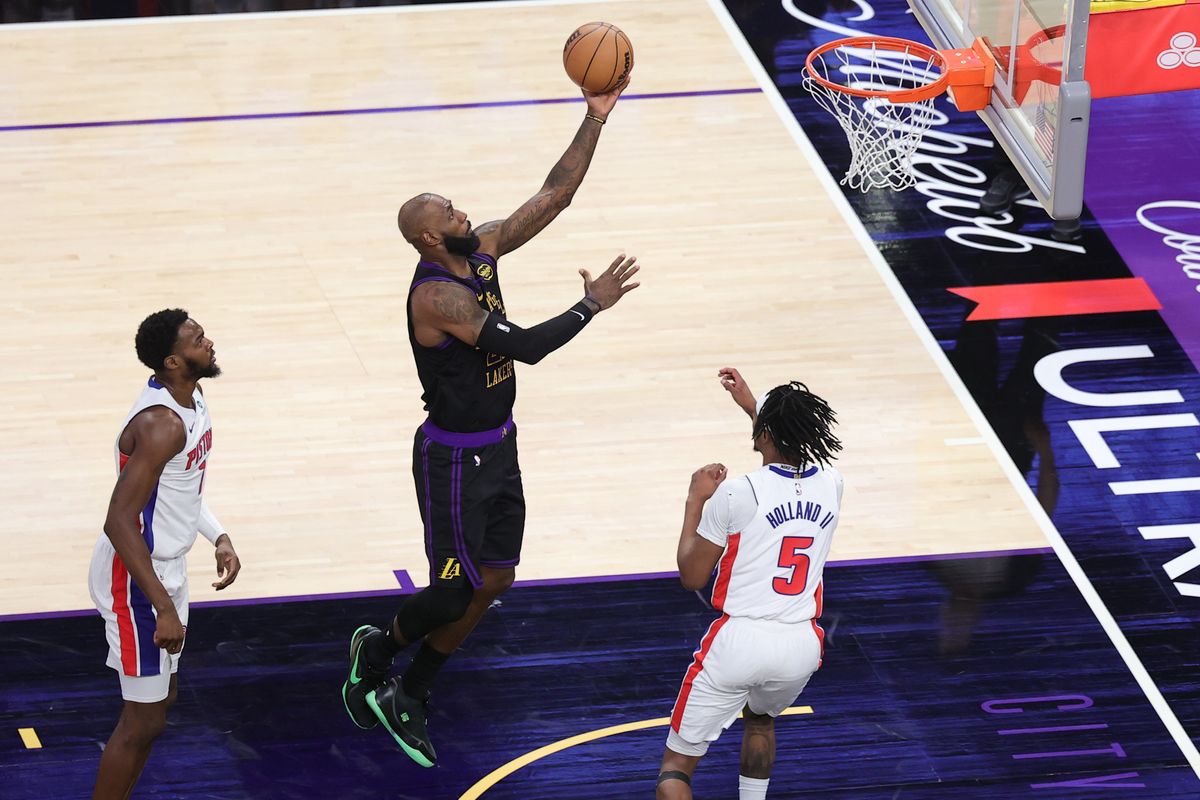 #23 SF LeBron James of the Los Angeles Lakers attempts a layup during an NBA game against the Detroit Pistons on December 30, 2025 in Los Angeles, CA.