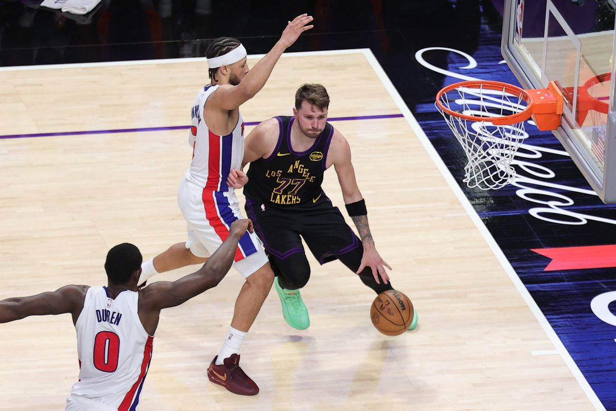 #77 PG Luka Doncic of the Los Angeles Lakers drives the lane during an NBA game against the Detroit Pistons on December 30, 2025 in Los Angeles, CA.