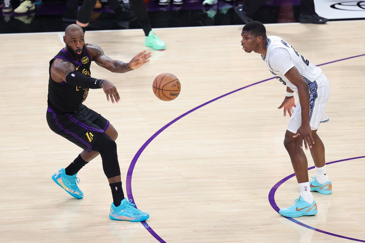 #23 SF LeBron James of the Los Angeles Lakers makes a pass during an NBA game against the Memphis Grizzlies on January 2, 2026 in Los Angeles, CA.
