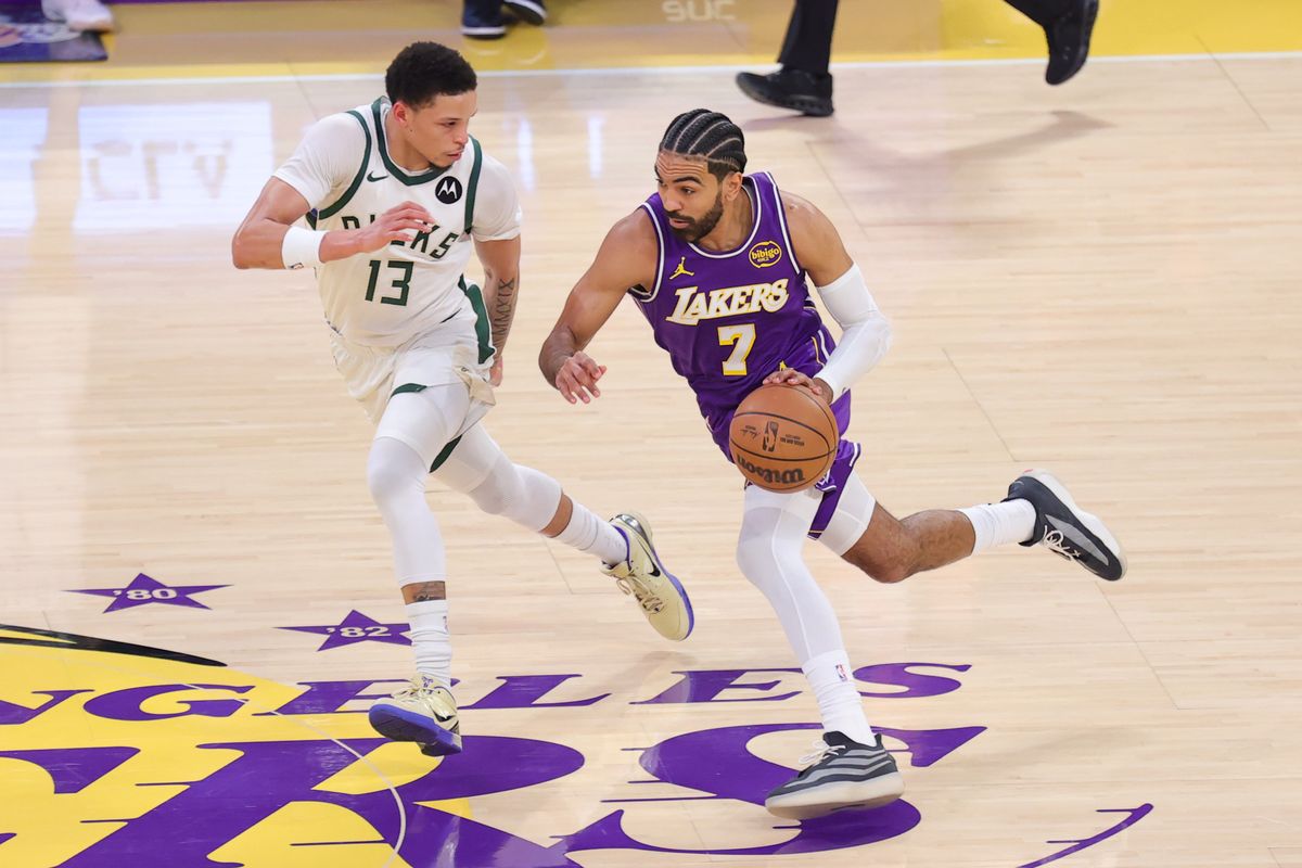 Los Angeles Lakers G Gabe Vincent (7) dribbles the basketball during an NBA game against the Milwaukee Bucks on January 9, 2026 in Los Angeles, CA.