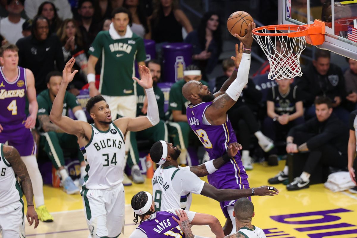 Los Angeles Lakers SF LeBron James (23) attempts a lay up during an NBA game against the Milwaukee Bucks on January 9, 2026 in Los Angeles, CA.