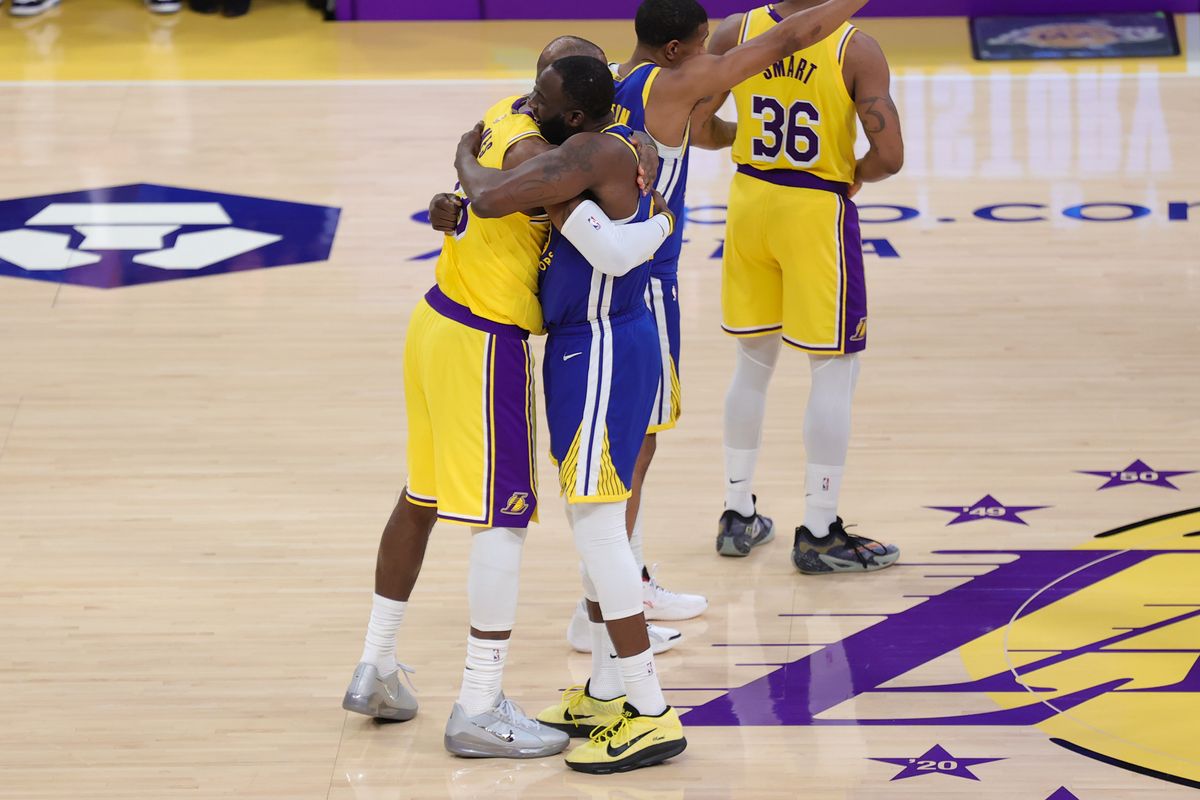 Los Angeles Lakers forward LeBron James (23) and Golden State Warriors forward Draymond Green (23) embrace each other before an NBA game on February 7, 2025 in Los Angeles, CA. Los Angeles Lakers forward LeBron James (23) and Golden State Warriors forward Draymond Green (23) embrace each other before an NBA game on February 7, 2025 in Los Angeles, CA.