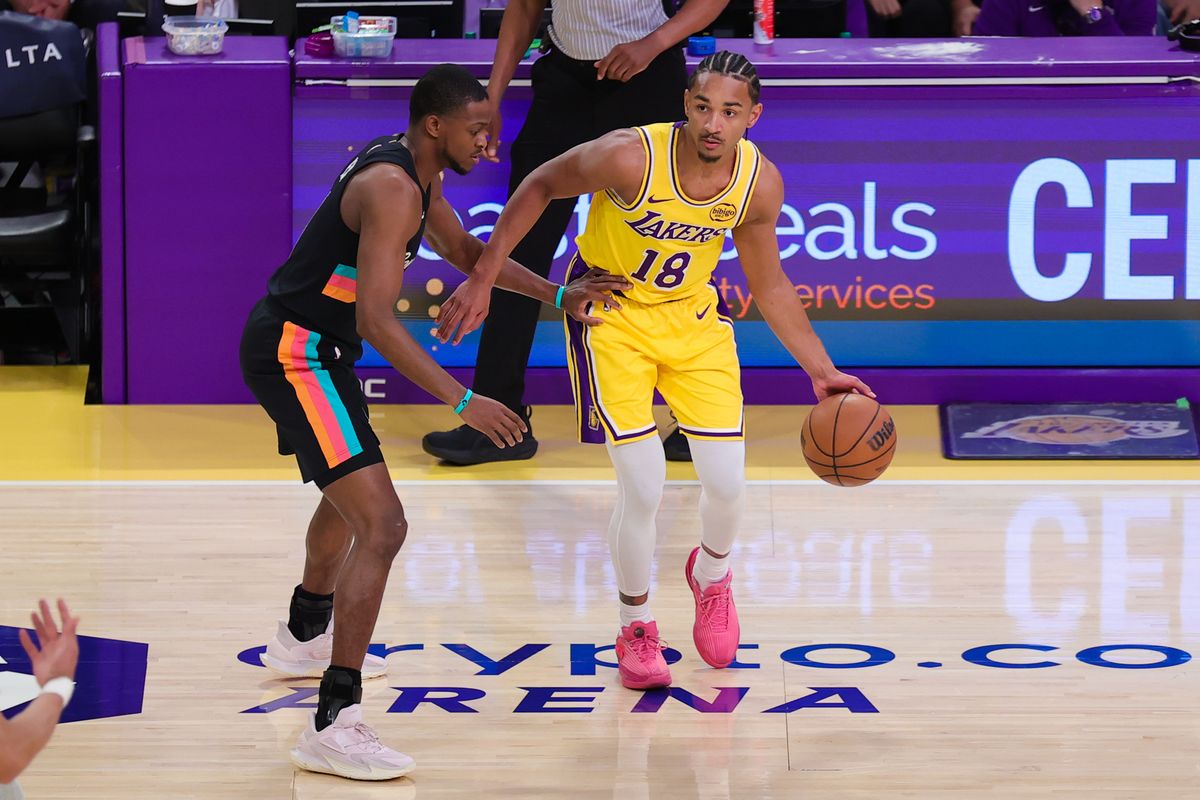 Los Angeles Lakers guard Kobe Bufkin (18) dribbles the basketball during an NBA game against the San Antonio Spurs on February 10, 2026 in Los Angeles, CA.
