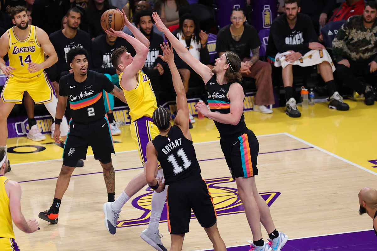 Los Angeles Lakers guard Dalton Knecht (4) shoots the basketball during an NBA game against the San Antonio Spurs on February 10, 2026 in Los Angeles, CA.
