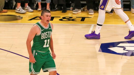 Boston Celtics guard Payton Prichard (11) celebrates hitting a 3-pointer before the half at crypto.com Arena. Boston Celtics guard Payton Prichard (11) celebrates hitting a 3-pointer before the half at crypto.com Arena.