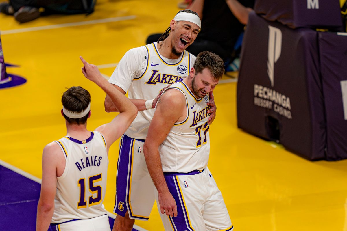 Los Angeles Lakers guard Luka Doncic (77) being celebrated by teammates during an NBA basketball game against the Sacramento Kings on March 1st, 2026 in Los Angeles, CA. Los Angeles Lakers guard Luka Doncic (77) being celebrated by teammates during an NBA basketball game against the Sacramento Kings on March 1st, 2026 in Los Angeles, CA.