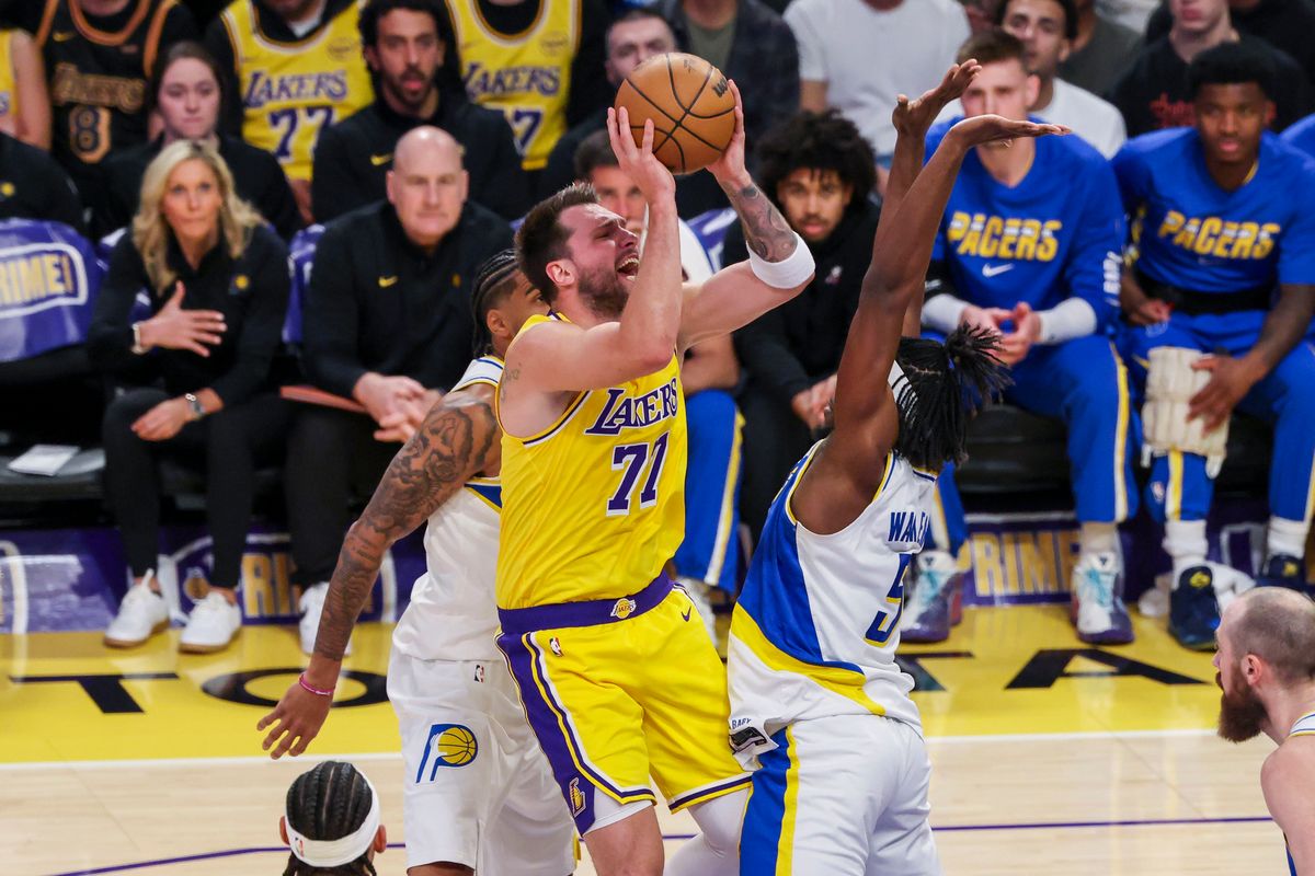 Luka Dončić #77 of the Los Angeles Lakers shoots the ball in traffic during an NBA basketball game against the Indiana Pacers, Friday March 6, 2026 in Los Angeles, Calif.