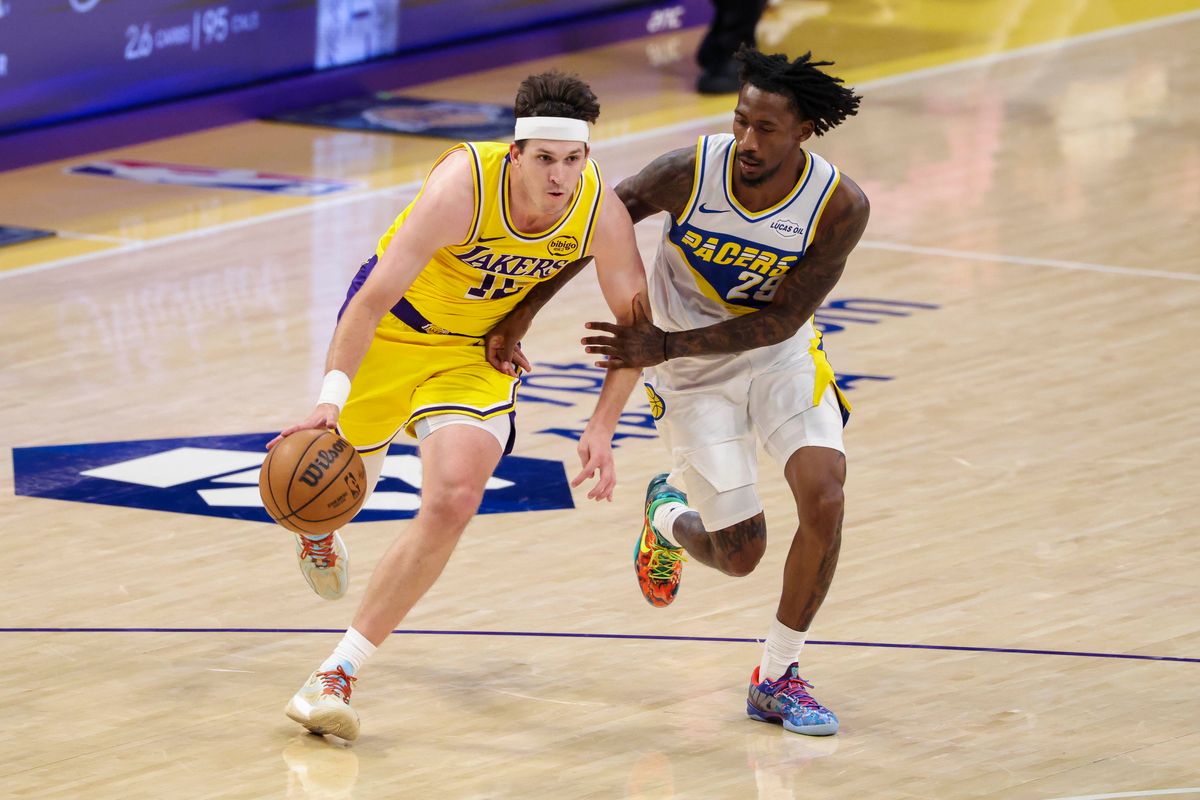 Austin Reaves #15 of the Los Angeles Lakers drives towards the basket during an NBA basketball game against the Indiana Pacers, Friday March 6, 2026 in Los Angeles, Calif.