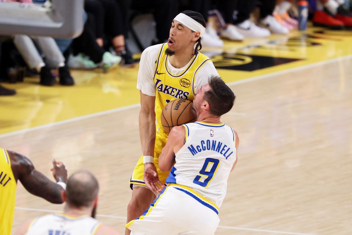 T.J. McConnell #9 of the Indiana Pacers collides with Jaxson Hayes #11 of the Los Angeles Lakers during an NBA basketball game, Friday March 6, 2026 in Los Angeles, Calif.
