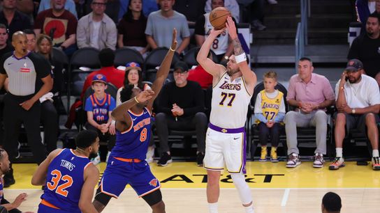 Los Angeles Lakers guard Luka Doncic (77) shoots the basketball during an NBA game against the New York Knicks on March 8, 2026 in Los Angeles, CA.