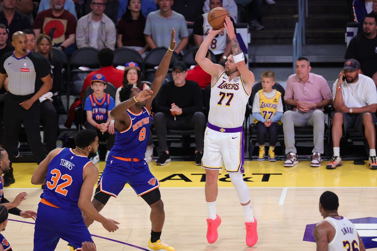 Los Angeles Lakers guard Luka Doncic (77) shoots the basketball during an NBA game against the New York Knicks on March 8, 2026 in Los Angeles, CA.