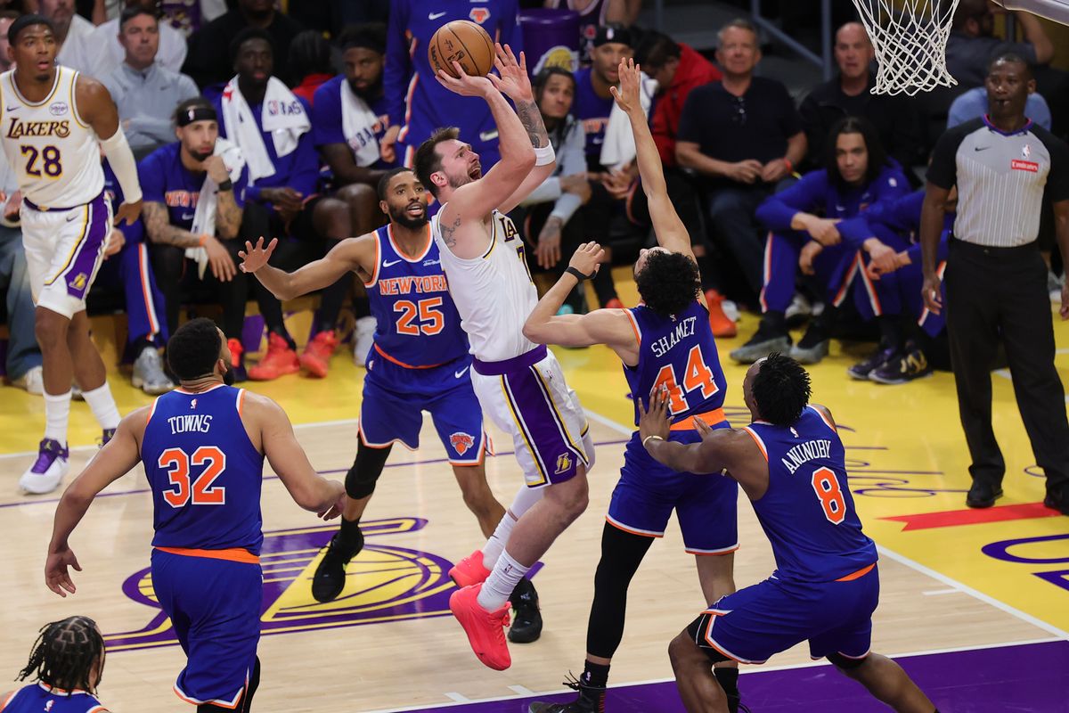 Los Angeles Lakers guard Luka Doncic (77) shoots the basketball during an NBA game against the New York Knicks on March 8, 2026 in Los Angeles, CA.