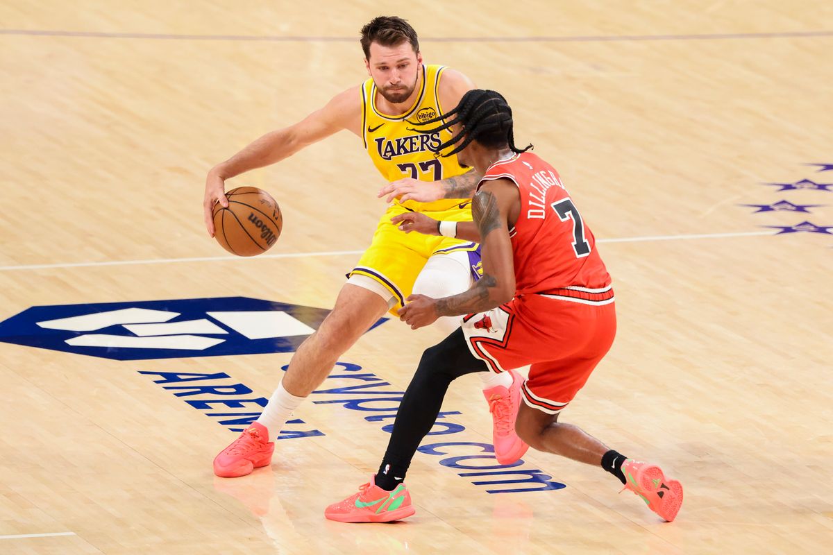 Luka Dončić #77 of the Los Angeles Lakers handles the bal against Rob Dillingham #7 of the Chicago Bulls during an NBA basketball game, Thursday March 12, 2026 in Los Angeles, Calif.