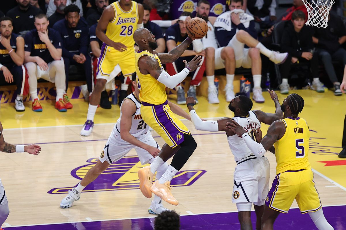 Los Angeles Lakers forward LeBron James (23) drives in for a lay up during an NBA game against the Denver Nuggets on March 14, 2026 in Los Angeles, CA. Los Angeles Lakers forward LeBron James (23) drives in for a lay up during an NBA game against the Denver Nuggets on March 14, 2026 in Los Angeles, CA.