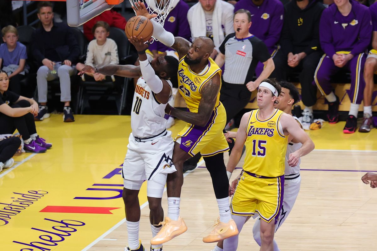 Los Angeles Lakers forward LeBron James (23) blocks the shot of Denever Nuggets guard Tim Hardaway Jr. (10) during an NBA game on March 14, 2026 in Los Angeles, CA. Los Angeles Lakers forward LeBron James (23) blocks the shot of Denever Nuggets guard Tim Hardaway Jr. (10) during an NBA game on March 14, 2026 in Los Angeles, CA.