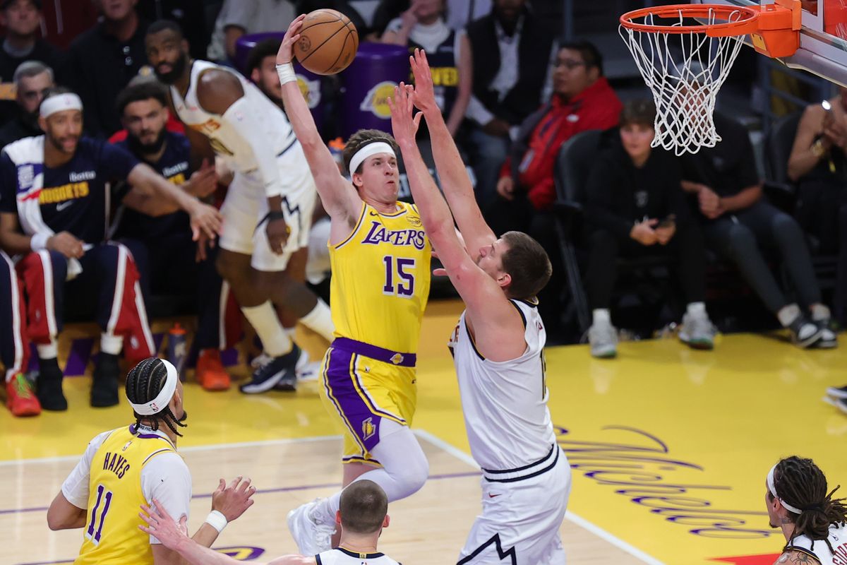 Los Angeles Lakers guard Austin Reaves (15) goes up for a lay up during an NBA game against the Denver Nuggets on March 14, 2026 in Los Angeles, CA. Los Angeles Lakers guard Austin Reaves (15) goes up for a lay up during an NBA game against the Denver Nuggets on March 14, 2026 in Los Angeles, CA.