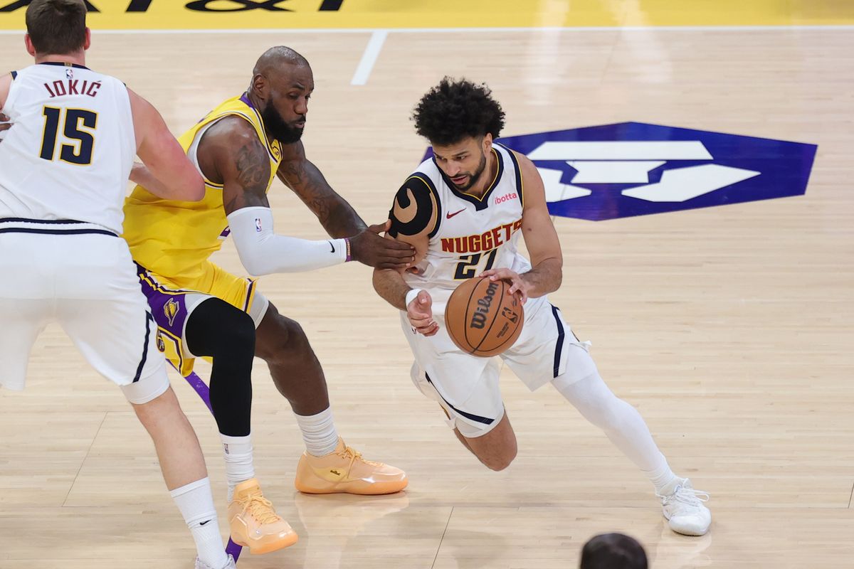 Los Angeles Lakers forward LeBron James (23) defends against Denver Nuggets guard Jamal Murray (27) during an NBA game on March 14, 2026 in Los Angeles, CA. Los Angeles Lakers forward LeBron James (23) defends against Denver Nuggets guard Jamal Murray (27) during an NBA game on March 14, 2026 in Los Angeles, CA.