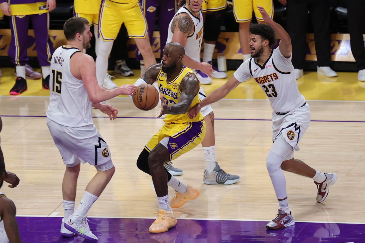 Los Angeles Lakers forward LeBron James (23) passes the basketball during an NBA game against the Denver Nuggets on March 14, 2026 in Los Angeles, CA. Los Angeles Lakers forward LeBron James (23) passes the basketball during an NBA game against the Denver Nuggets on March 14, 2026 in Los Angeles, CA.