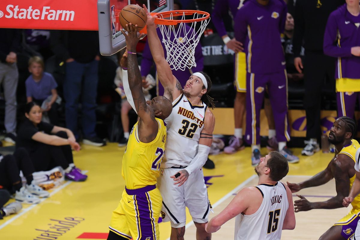 Denver Nuggets forward Aaron Gordon (32) blocks the shot of Los Angeles Lakers forward LeBron James (23) during an NBA game on March 14, 2026 in Los Angeles, CA. Denver Nuggets forward Aaron Gordon (32) blocks the shot of Los Angeles Lakers forward LeBron James (23) during an NBA game on March 14, 2026 in Los Angeles, CA.