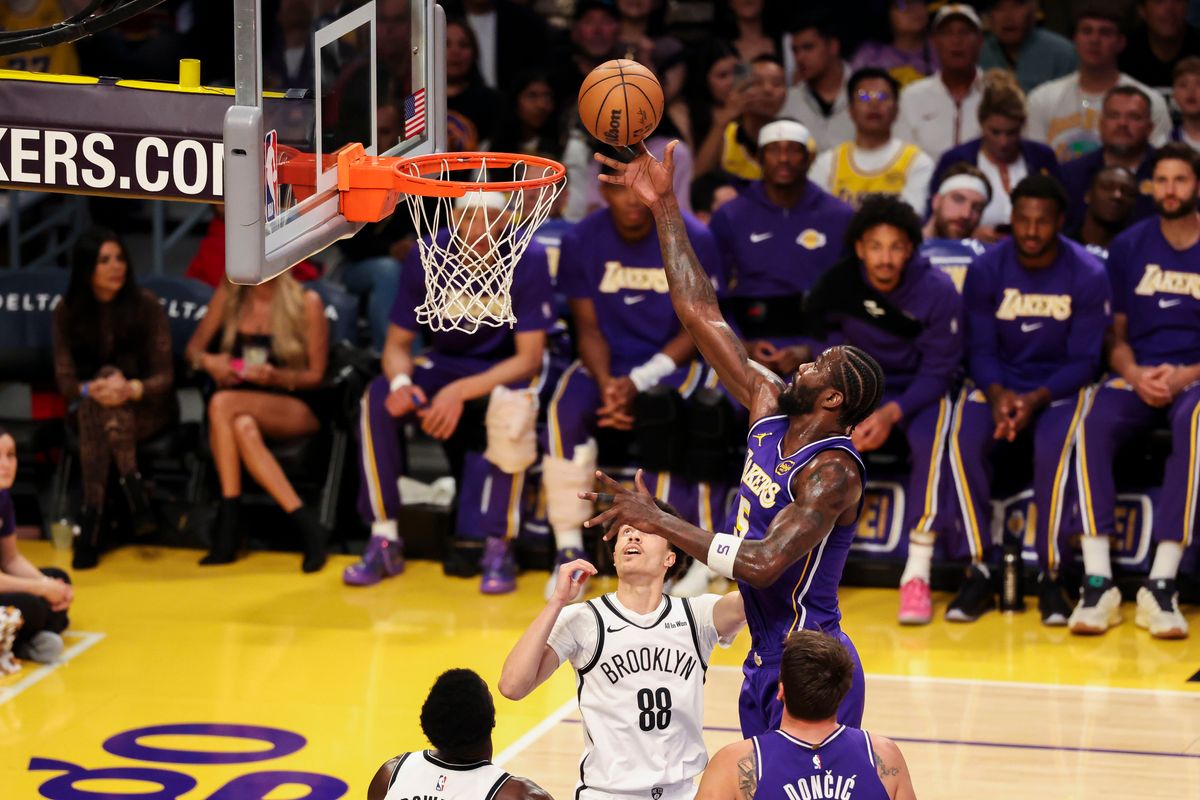 Deandre Ayton #5 of the Los Angeles Lakers lays the ball up during an NBA basketball game against the Brooklyn Nets, Friday March 27, 2026 in Los Angeles, Calif.