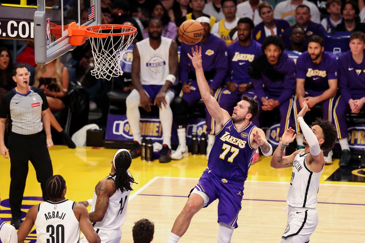 Luka Doncic #77 of the Los Angeles Lakers lays the ball up during an NBA basketball game against the Brooklyn Nets, Friday March 27, 2026 in Los Angeles, Calif.
