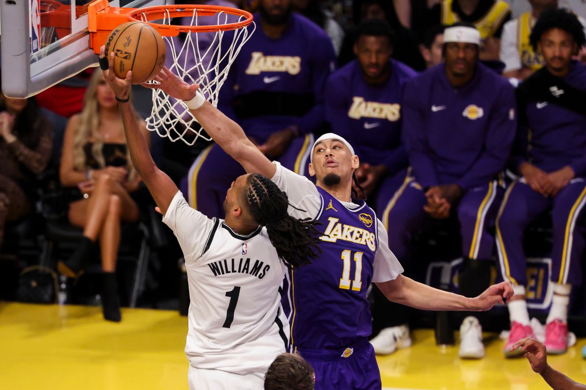 Jaxson Hayes #11 of the Los Angeles Lakers reaches to block the layup by Ziaire Williams #1 of the Brooklyn Nets during an NBA basketball game, Friday March 27, 2026 in Los Angeles, Calif.