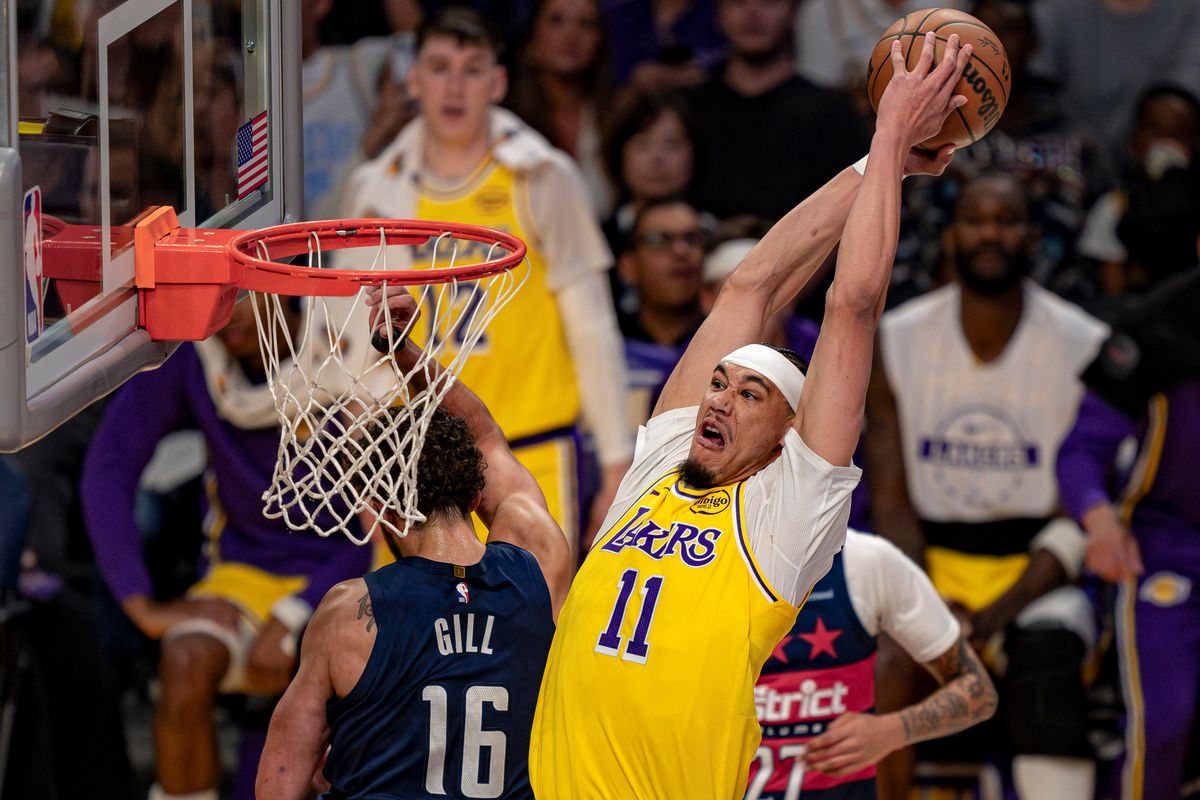Los Angeles Lakers center Jaxson Hayes (11) posterizing Anthony Gill (16) during an NBA basketball game against the Washington Wizards on March 30th, 2026 in Los Angeles, CA.