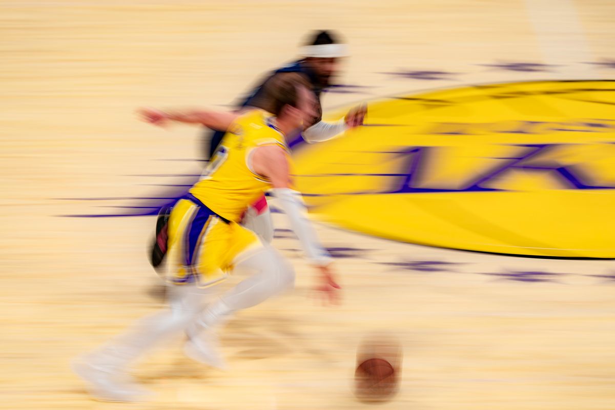 Los Angeles Lakers guard Luke Kennard (10) dribbling during an NBA basketball game against the Washington Wizards on March 30th, 2026 in Los Angeles, CA.