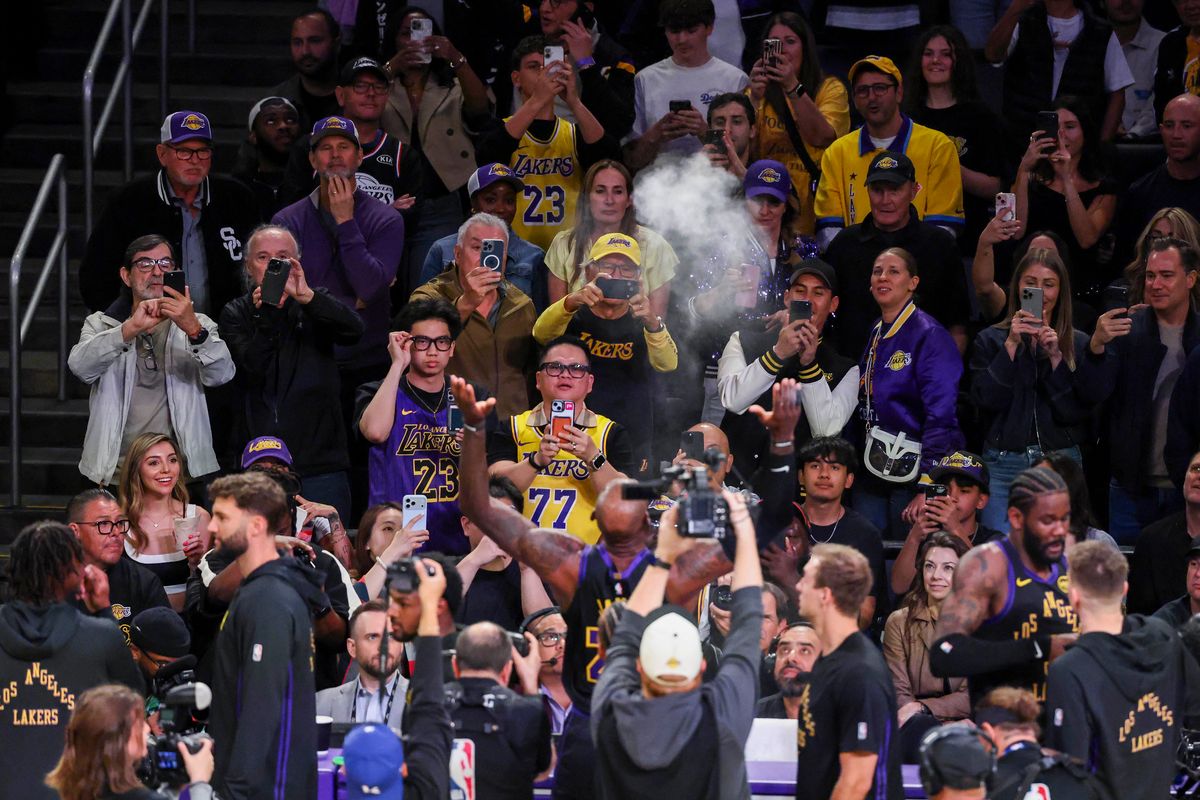 Fans look on as LeBron James #23 of the Los Angeles Lakers throws chalk in the air before an NBA basketball game against the Cleveland Cavaliers, Tuesday March 31, 2026 in Los Angeles, Calif. Fans look on as LeBron James #23 of the Los Angeles Lakers throws chalk in the air before an NBA basketball game against the Cleveland Cavaliers, Tuesday March 31, 2026 in Los Angeles, Calif.
