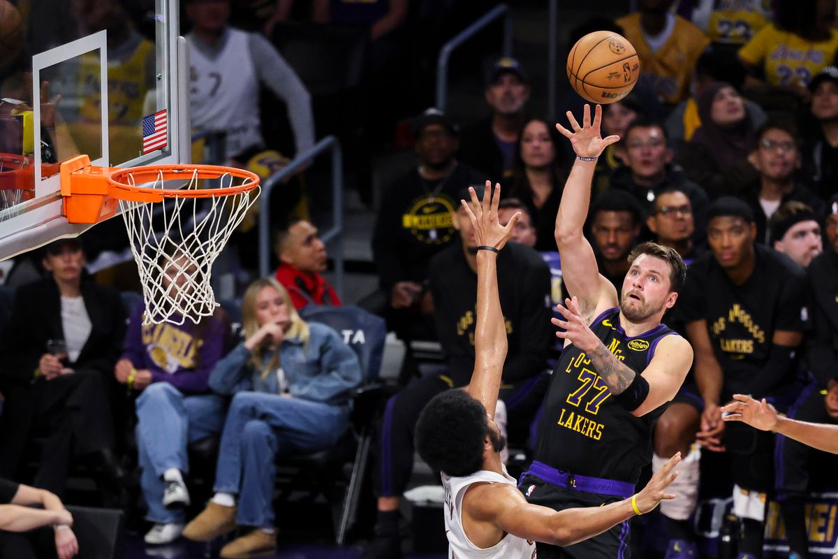 Luka Doncic #77 of the Los Angeles Lakers tosses a lob towards the rim during an NBA basketball game against the Cleveland Cavaliers, Tuesday March 31, 2026 in Los Angeles, Calif. Luka Doncic #77 of the Los Angeles Lakers tosses a lob towards the rim during an NBA basketball game against the Cleveland Cavaliers, Tuesday March 31, 2026 in Los Angeles, Calif.