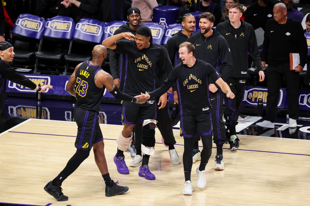 LeBron James #23 is celebrated by Rui Hachimura #28, Luke Kennard #10 and the rest of the Los Angeles Lakers bench during an NBA basketball game against the Cleveland Cavaliers, Tuesday March 31, 2026 in Los Angeles, Calif. LeBron James #23 is celebrated by Rui Hachimura #28, Luke Kennard #10 and the rest of the Los Angeles Lakers bench during an NBA basketball game against the Cleveland Cavaliers, Tuesday March 31, 2026 in Los Angeles, Calif.
